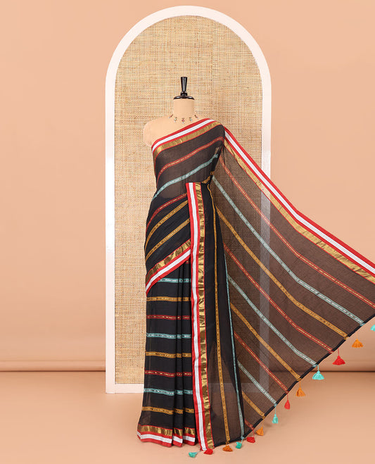 Black horizontal multi-colored striped Khadi mul cotton saree, contrast satin gold zari piping border, striped pallu, and a matching blouse