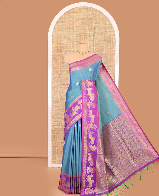 Blue zari buttas elite soft silk saree, contrast traditional zari border of Pichwai cow design, scallop pallu, and a contrast zari design blouse