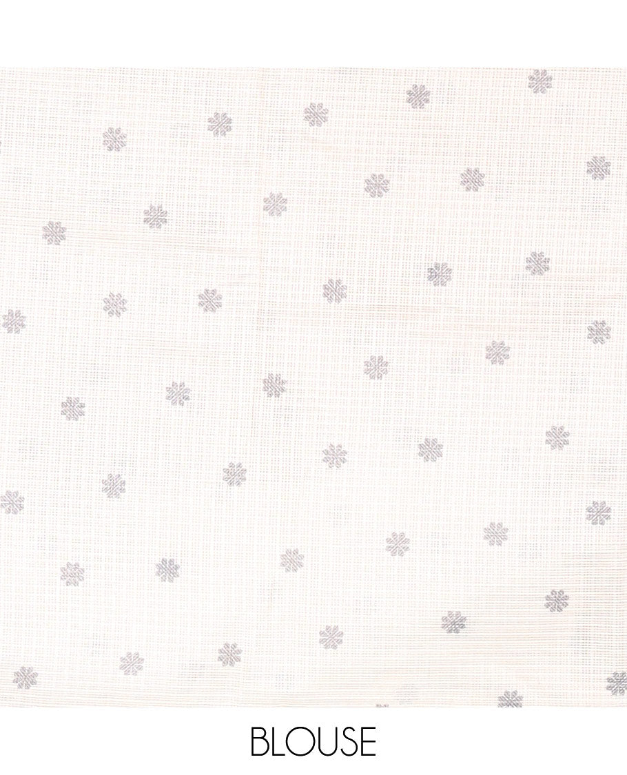 Cream Kota Chex Saree Featuring Floral Motif Prints, Accentuated by a Contrast Border and Pallu with Floral Silhouette Prints, Paired with a Matching Floral-Printed Blouse