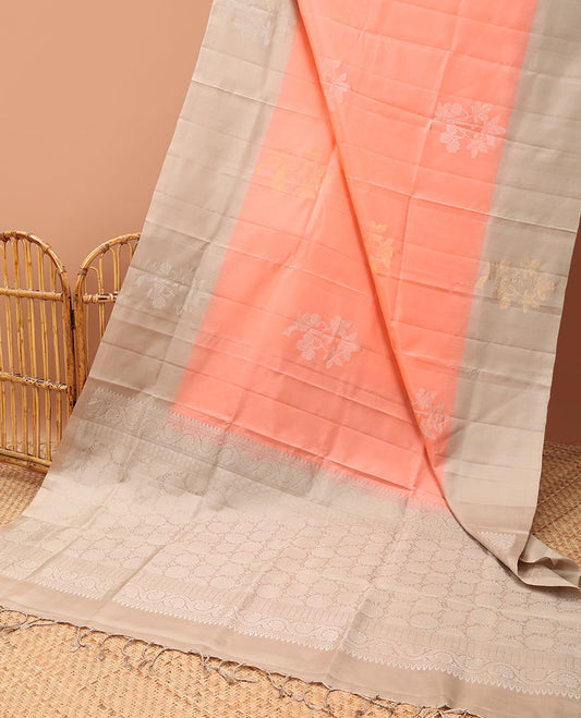 Peach floral buttas soft silk saree with contrast floral border & round buttas pallu
