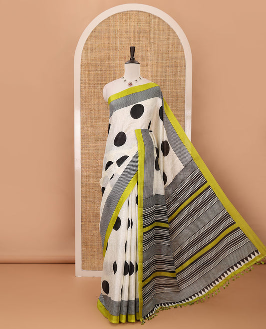 Cream polka dot printed khadi cotton saree, contrast piping border with stripes print, stripes printed pallu & green stripes printed blouse