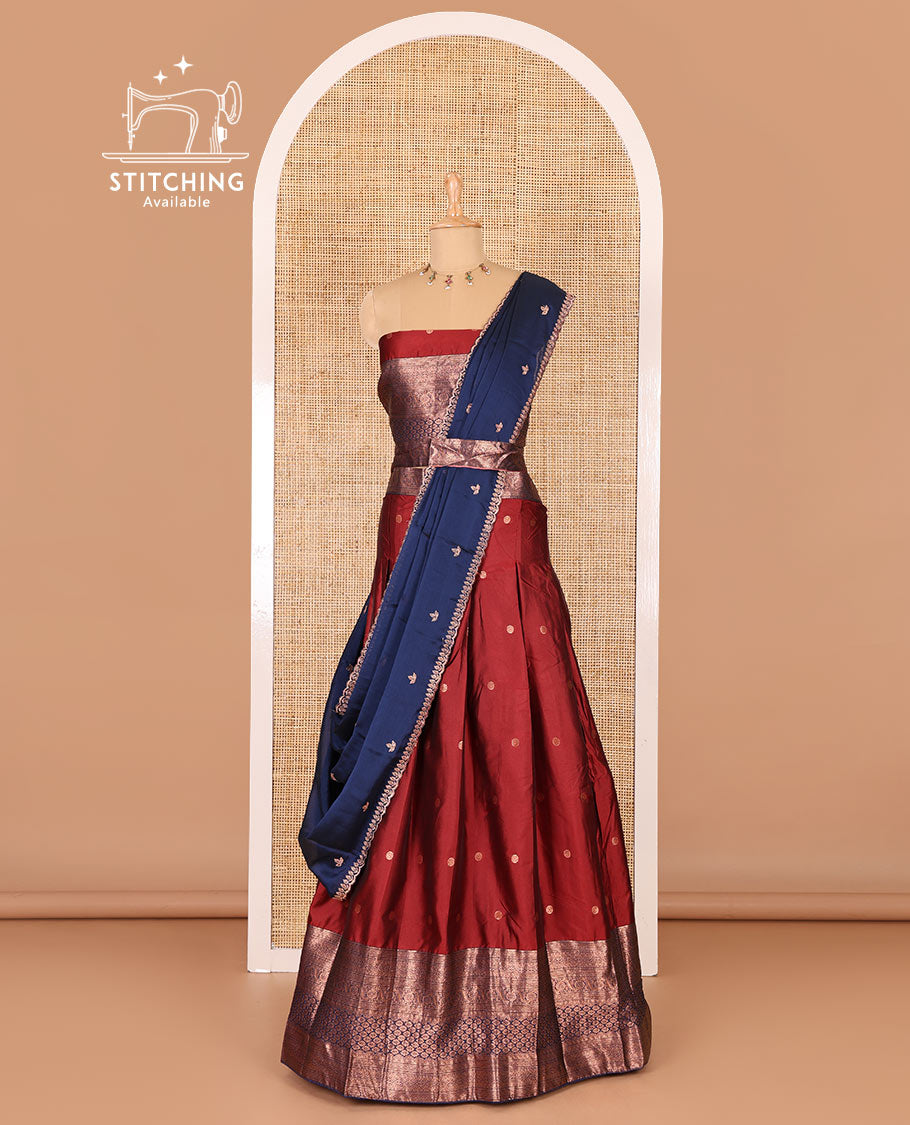 Maroon taffeta silk half-saree, flower zari buttas and contrast traditional zari bordered skirt, a matching blouse, and contrast embroidered satin georgette scallop dhavani