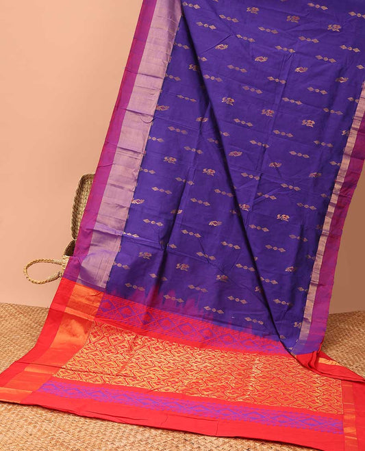 Green kuppadam silk saree with buttas, plain border & contrast pallu of intricate designs