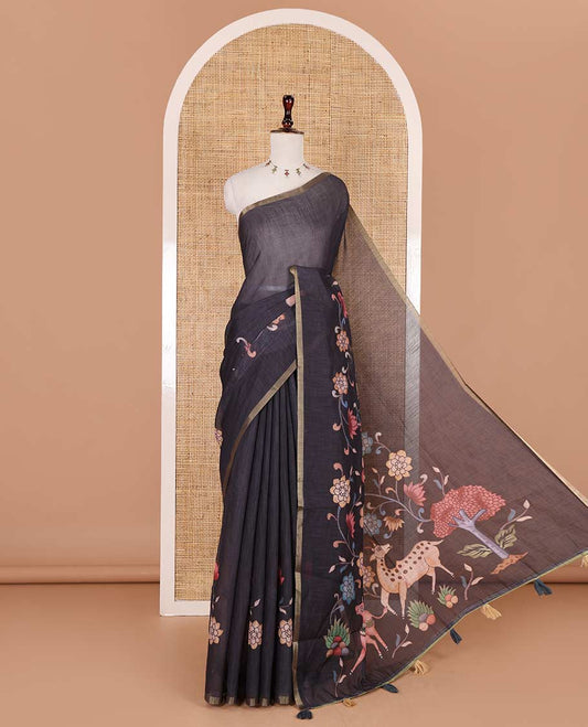Black kalamkari floral vine, horse, and deer motifs printed linen cotton saree, piping border, printed pallu, and a contrast printed blouse