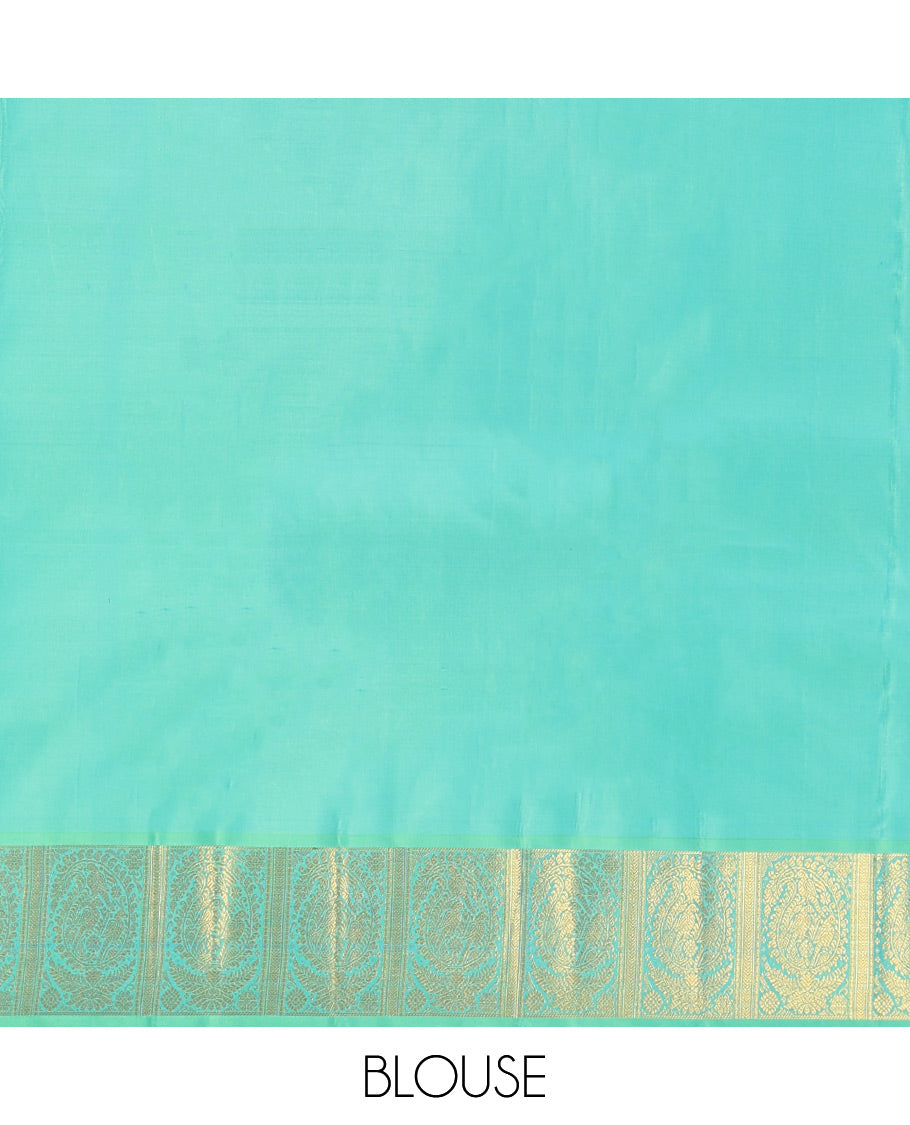 Purple Kanchipuram Silk Saree, Decked Up with Zari Buttas, a Contrast Korvai Manga Border, Intricate Pallu, and a Contrast Blouse