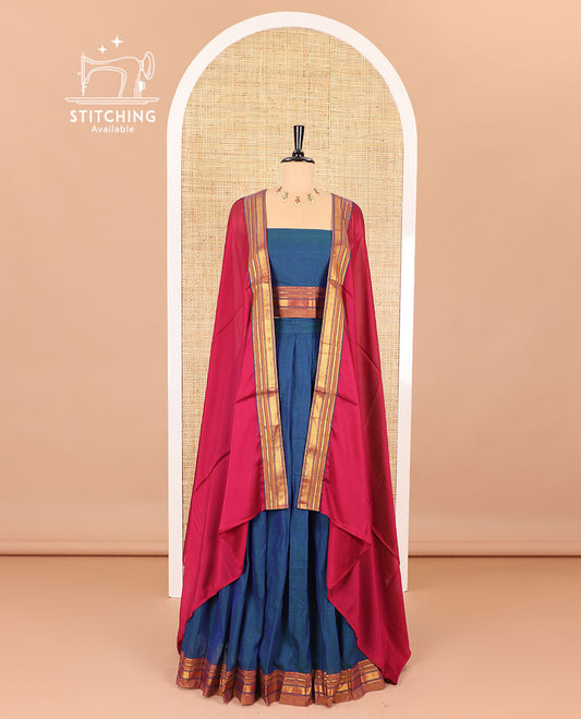 Blue half saree, plain with contrast traditional zari bordered skirt, matching blouse and a contrast peacock border dhavani