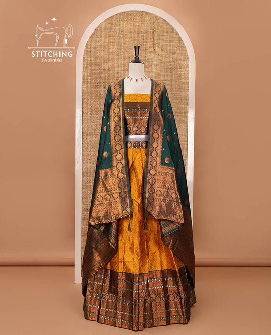 Mustard semi-banaras half-saree, embossed & contrast traditional zari border skirt,blouse of embossed & zari work & contrast green zari design dhavani
