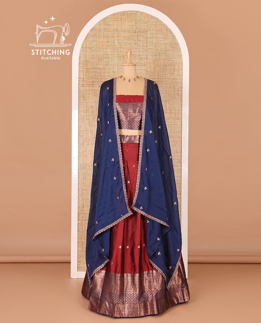 Maroon taffeta silk half-saree, flower zari buttas and contrast traditional zari bordered skirt, a matching blouse, and contrast embroidered satin georgette scallop dhavani