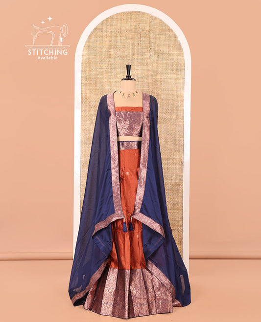 Rust and Blue Semi-Banarasi Half-Saree, Detailed with Zari Buttas on Its Skirt, Complemented by a Contrast Traditional Zari-Design Border, Paired with a Matching Blouse, and a Contrast Satin Georgette Zari-Bordered Dhavani