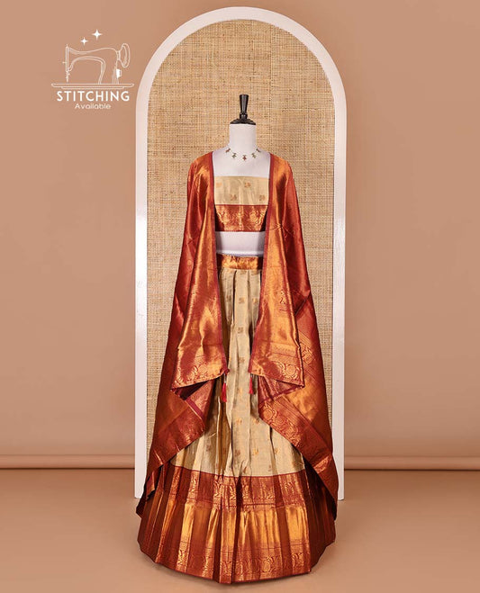 Gold banaras half saree, zari buttas with contrast maroon traditional zari border skirt, matching blouse, dhavaniof zari checks, and buttas