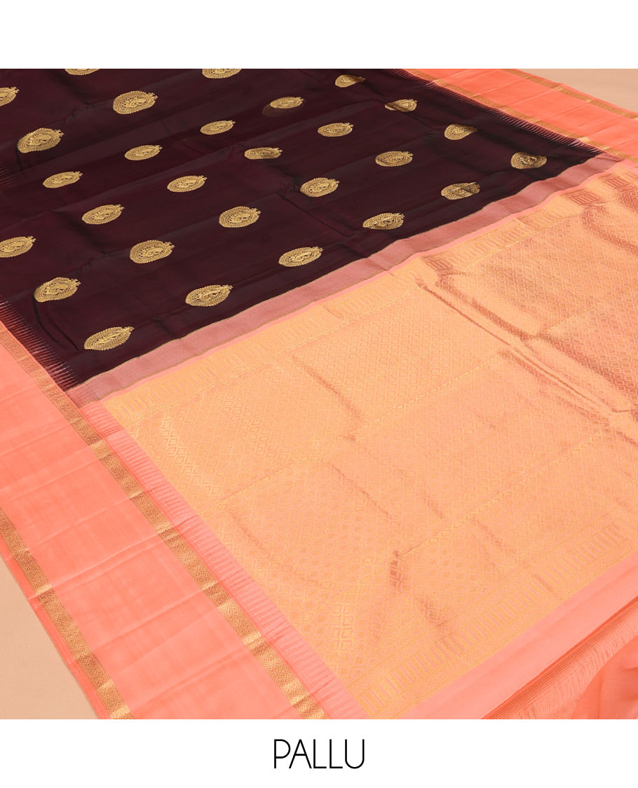 Coffee Brown Vasundhara Silk Saree Accentuated with Round Mayil Buttas, Complemented with Contrast Rettai Pettu Thazampoo Rekku Zari Border, Beautifully Woven Pallu of Jaal Design, and Paired with a Contrast Blouse
