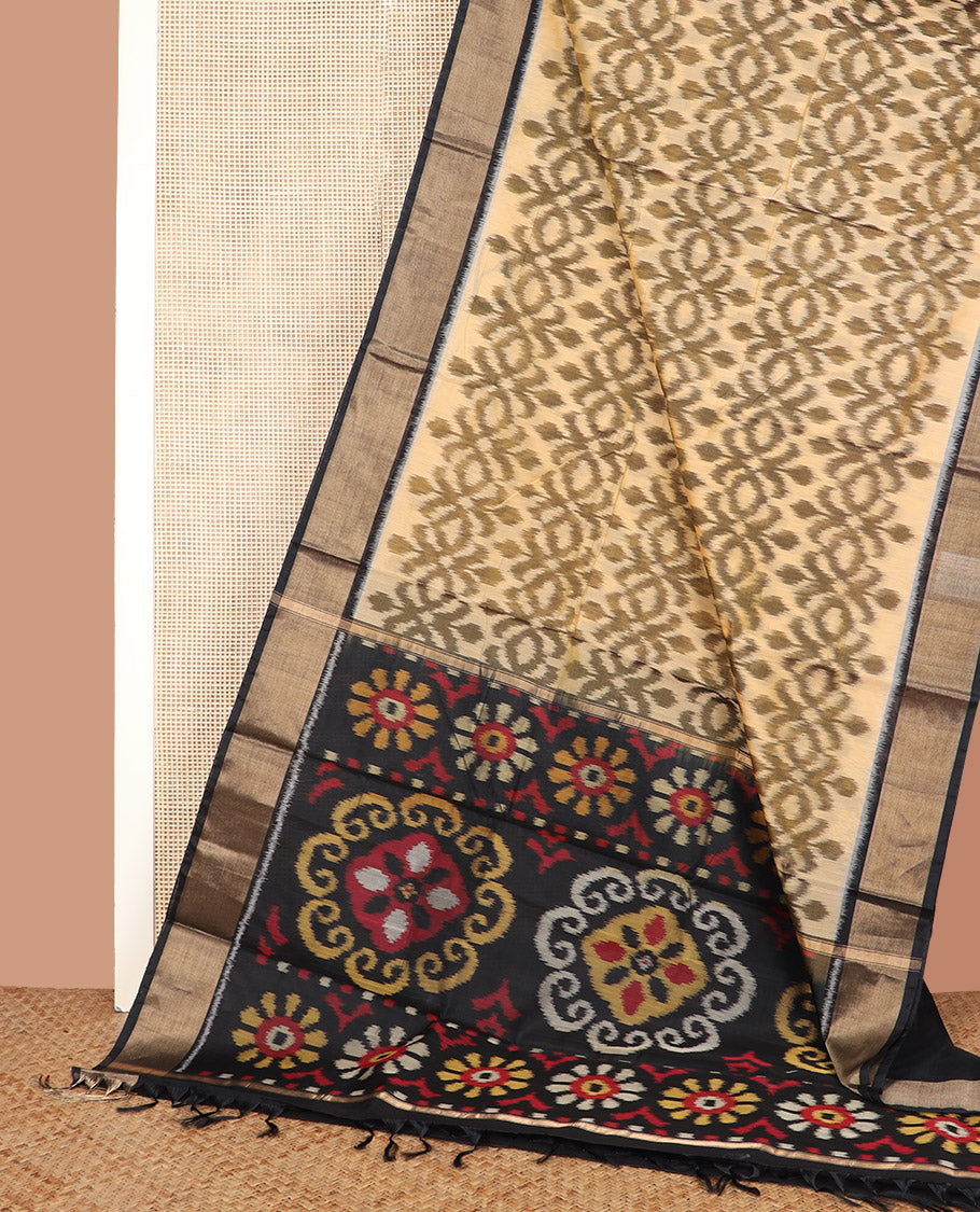 Sandal Base Ikkat Cotton Saree, Bedecked with Ikkat-Style Intricate Patterns Woven All Over Its Body, Complemented by a Contrast Border, Pallu of Floral Designs in Ikkat Weave, and Paired with a Contrast Blouse