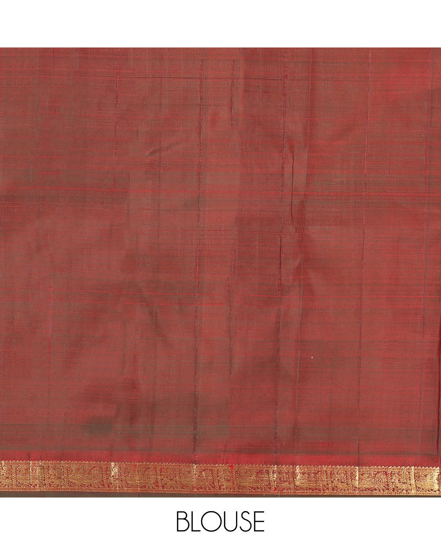 Red Kanchipuram Silk Saree, Decked Up with Zari Buttas All Over Its Body, Complemented by a Contrast Border of Ara Bogudi, Yaanai, and Annam Designs, Grand Pallu, and Paired with a Contrast Blouse