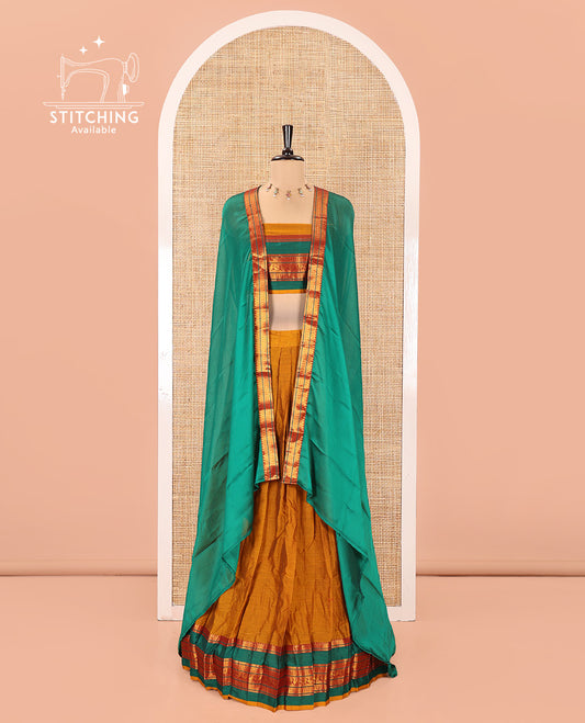 Mustard-Green Mercerised Cotton Half-Saree Features Plain with Contrast Traditional Zari Varisai Pettu Annam-Motif Bordered Skirt, Paired with a Matching Blouse, and Comes with a Contrast Zari-Bordered Dhavani