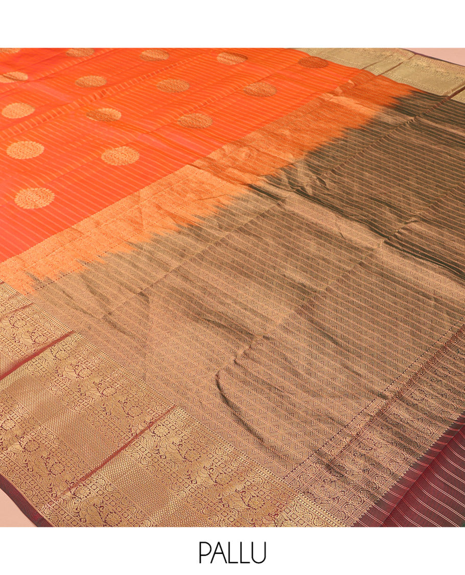 Orange Vasundhara Lite Silk Mix Saree, Bedecked with Zari Buttas and Stripes, a Contrast Border of Kodi Visiry, Mayil, and Mayil Kann Designs, Jaal Pallu, and a Contrast Blouse