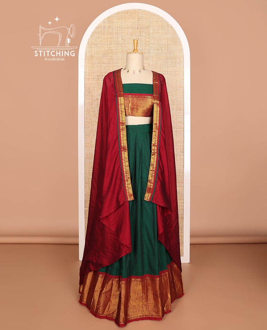 Green mercerised cotton daman zari border  half saree with mercerised cotton blouse & skya georgette one side zari border work