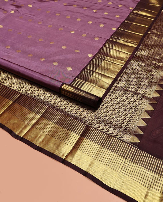 Purple Venkatagiri Silk Saree, Adorned with Zari Buttas All Over Its Body, Complemented by a Contrast Traditional Zari Border, Pallu of Diagonal Stripes and Buttas, and Paired with a Contrast Blouse