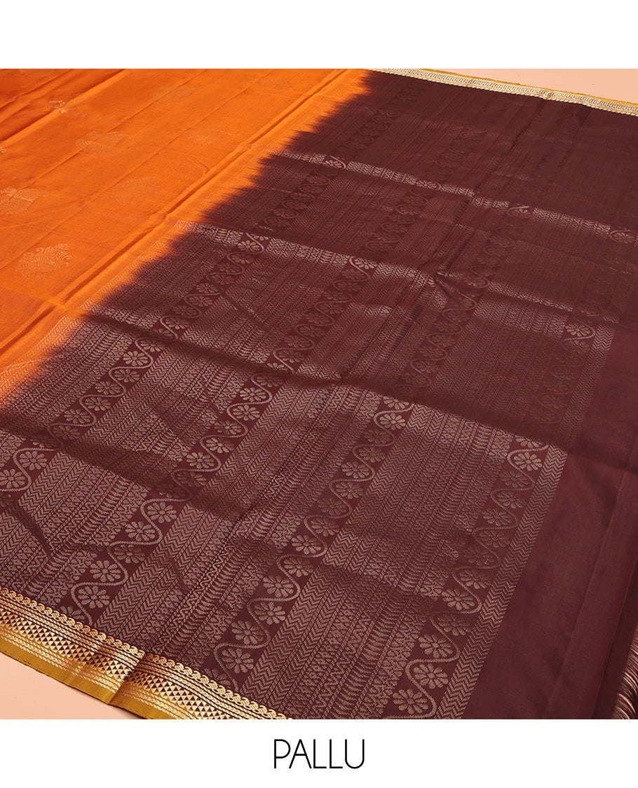 Orange Mayuri Soft Silk Saree, Accentuated with Zari Buttas All Over Its Body, Highlighted by Zari Border of Manga Mokku, and Ara Maadam Designs, and Paired with a Contrast Geometric Patterned Pallu and Paired with a Contrast Blouse