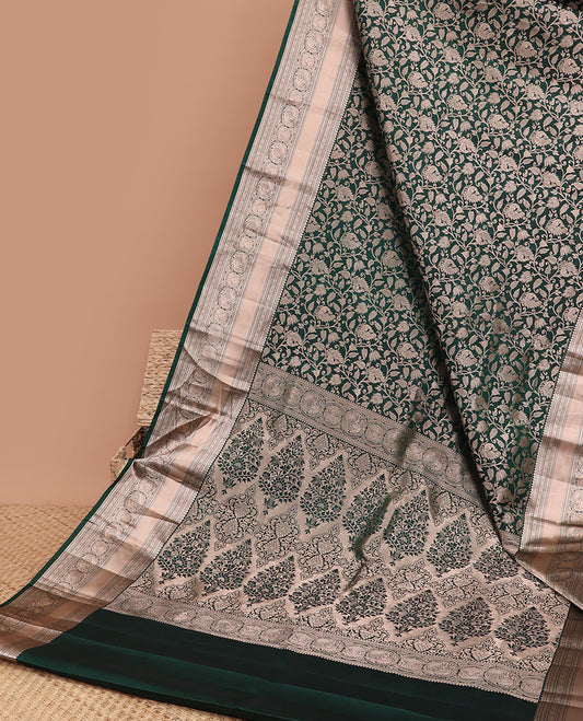 Green floral jacquard kancheepuram silk saree with self border of rekku, banaras, paun designs & floral zari design pallu