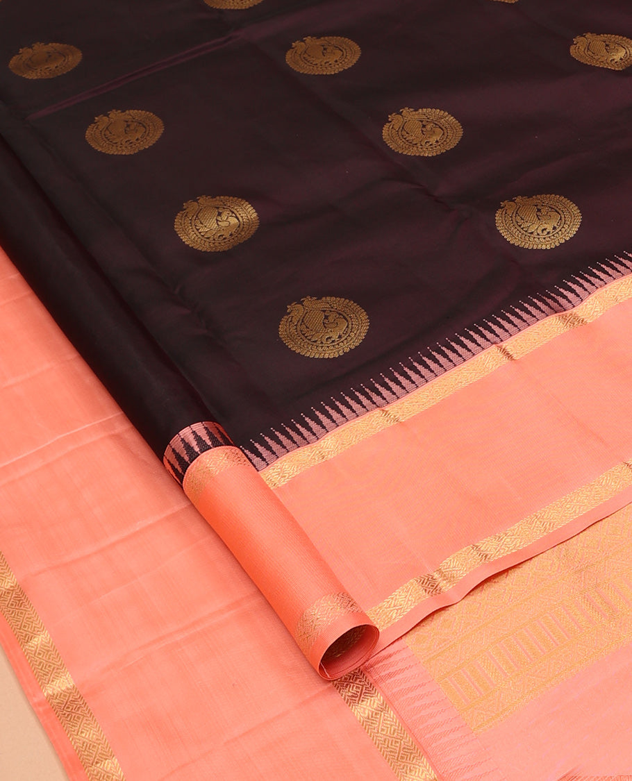 Coffee Brown Vasundhara Silk Saree Accentuated with Round Mayil Buttas, Complemented with Contrast Rettai Pettu Thazampoo Rekku Zari Border, Beautifully Woven Pallu of Jaal Design, and Paired with a Contrast Blouse