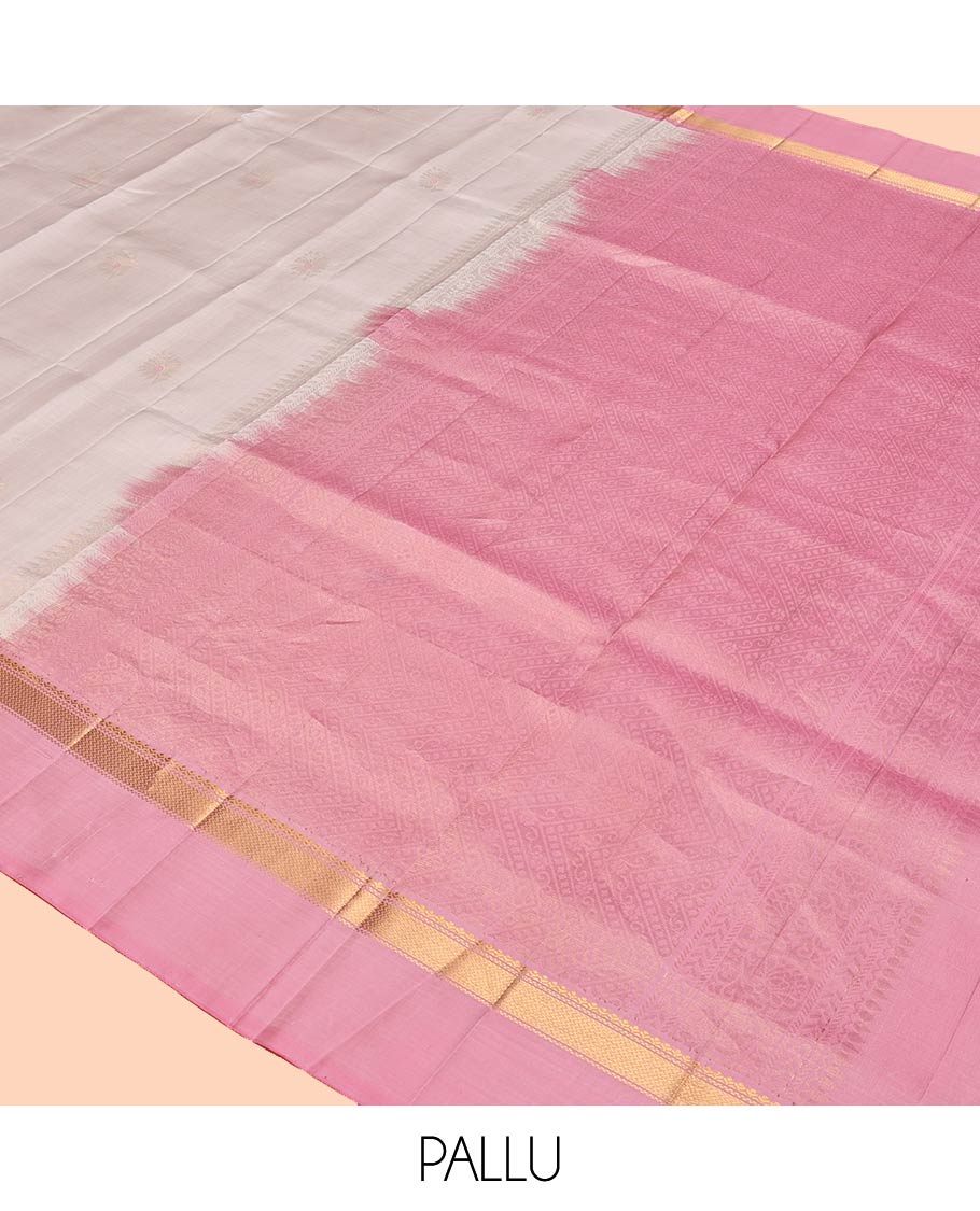 White Mayuri Soft Silk Saree, Simply Sparkled with Buttas All Over Its Body, Complemented by Contrast Kal Eragina Border of Vanki Designs, Sparsely Sparkled Pallu, and Paired with a Contrast Blouse