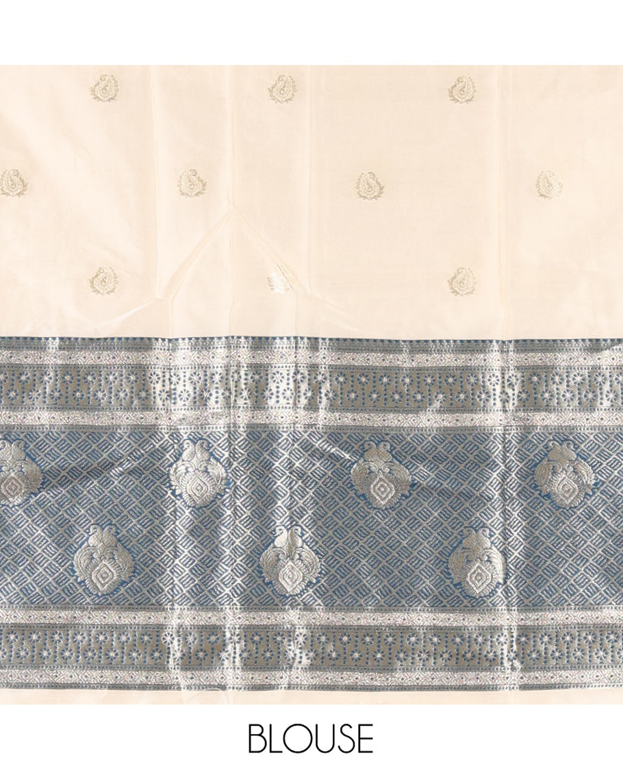 Cream-Peacock Blue Semi-Banarasi Half-Saree Set Featuring Buttas Skirt, Contrast Traditional Border, a Matching Blouse, and a Banaras Dhavani