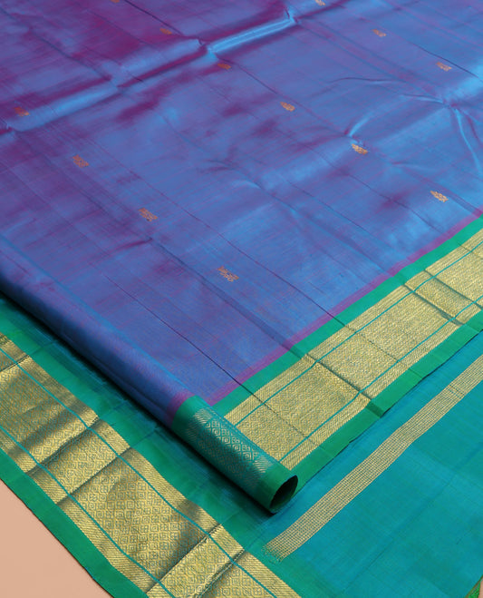 Blue Kanchipuram Silk Saree, Woven with Zari Buttas, a Contrast One-Sided Border of Banaras, and Jaal Designs, Zari Design Pallu, and No Blouse