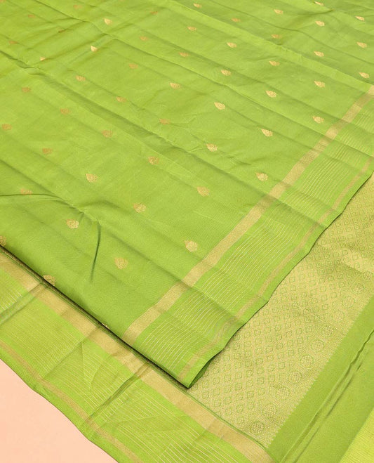 Green Vasundhara Lite Silk Mix Saree, Subtly Sparkled with Zari Buttas All Over Its Body, Highlighted by a Zari Striped Border, Jaal-Patterned Pallu, and Paired with a Matching Blouse