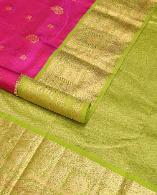 Pink buttas silk saree with contrast border of intricate zari design & checked design pallu