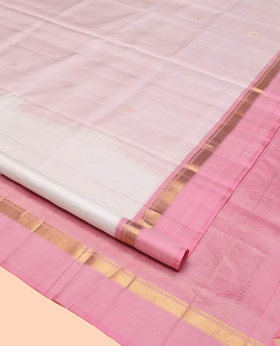 White Mayuri Soft Silk Saree, Simply Sparkled with Buttas All Over Its Body, Complemented by Contrast Kal Eragina Border of Vanki Designs, Sparsely Sparkled Pallu, and Paired with a Contrast Blouse