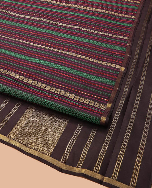 Brown-Base Kanchipuram Designer Silk Saree, Meenakari-Style Woven with Rekku, Neli, Banaras, Mayil Kann, and Annam Designs, Subtle Zari-Piping Border, Pallu Features Jaal Designs, and Paired with a Matching Blouse