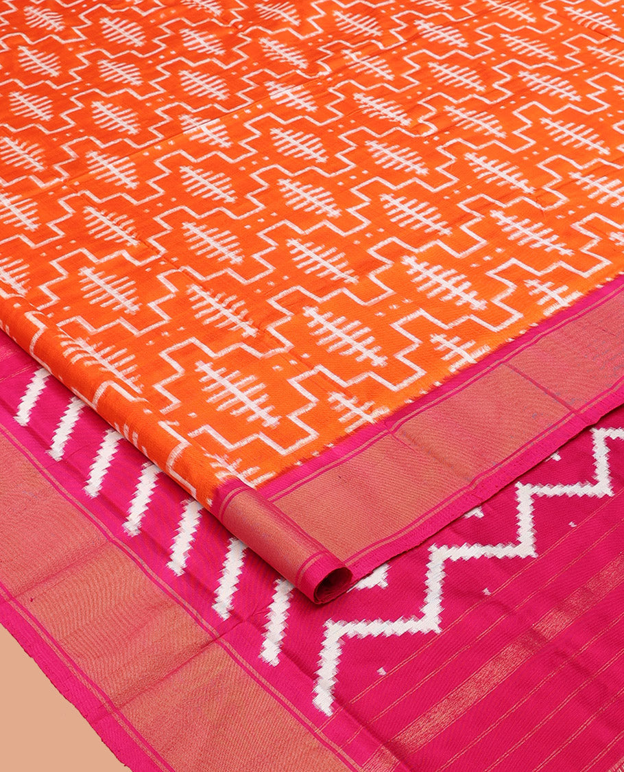 Orange Ikkat Silk Saree, Mesmerized with Ikkat-Style Geometric Patterns on Its Body, Complemented by a Contrast Border, Pallu Features Chevron Stripes, and Paired with a Contrast Blouse