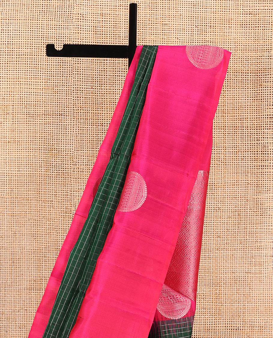 Green checked Kanchipuram silk saree, contrast border of geometric motifs, and jaal pallu