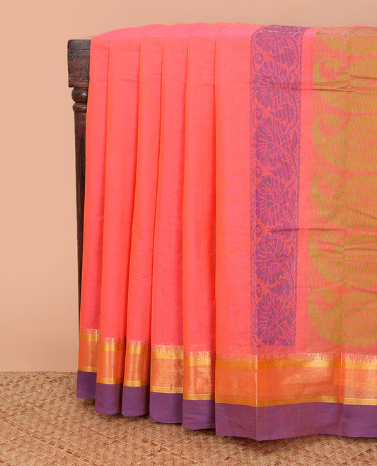 Orange thread buttas Kanchi cotton saree, contrast zari border, and pallu of floral, and paisley designs