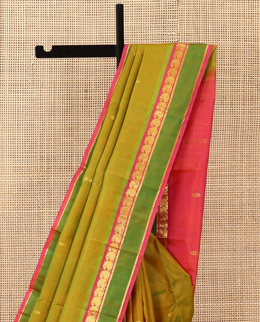 Green striped and buttas Kanchipuram silk saree, contrast rettai pettu border of manga and kathir designs, and zari design pallu