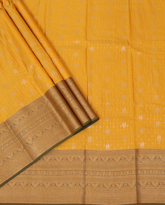 Yellow Art Silk Pavadai Material Set, Elegantly Designed Zari Designs All Over the Skirt, Complemented by a Contrast Traditional Zari Design Border, and Paired with a Contrast Blouse