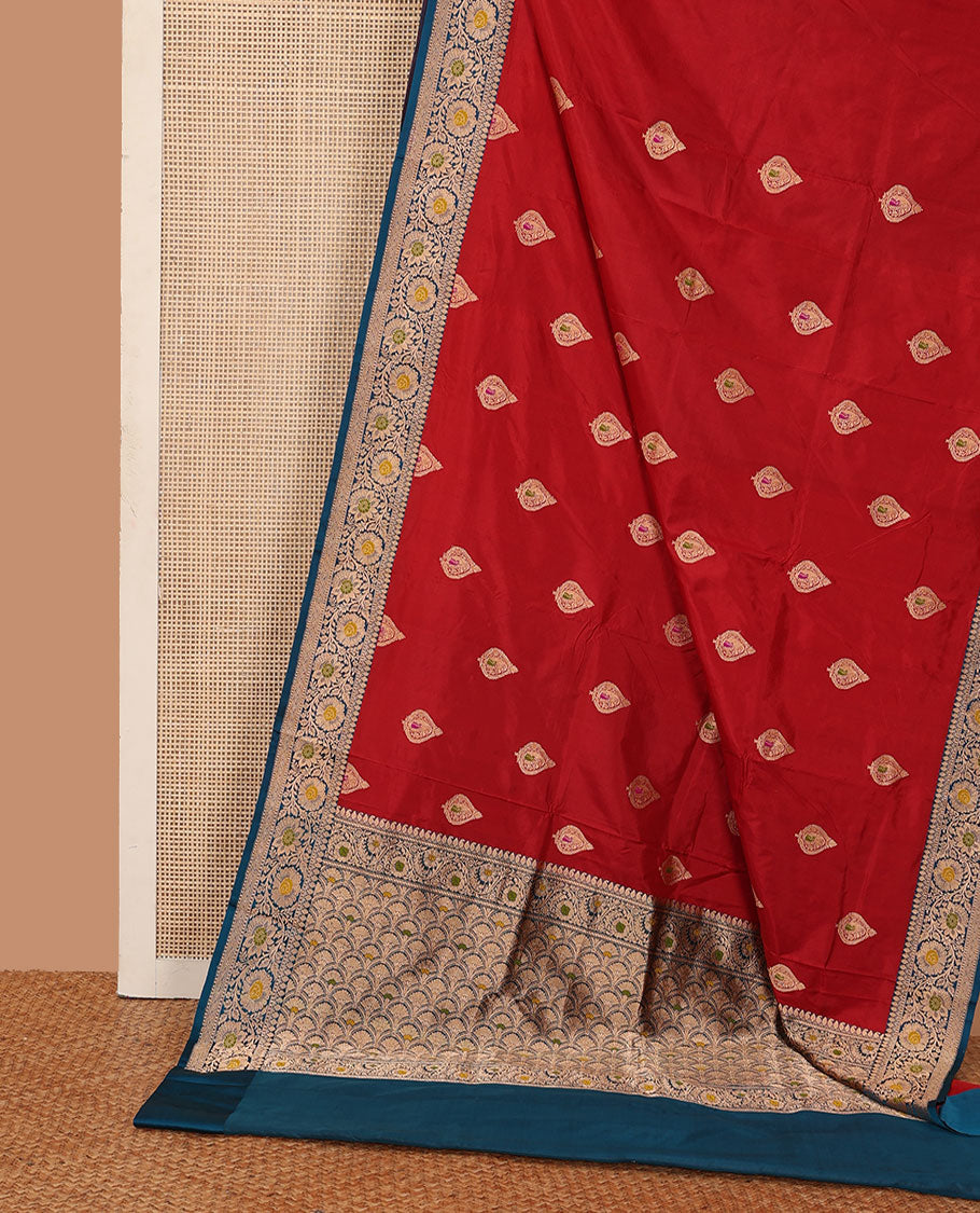 Red thilakam motifs kathan silk saree, contrast traditional border of floral creeper design, and scallop design pallu