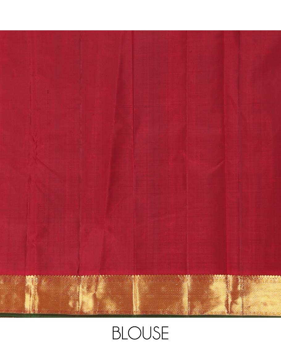 Green plain Kanchipuram silk saree, contrast border of thilakam mokku, muthu, cross kamalam, and zari stripes, and zari woven pallu
