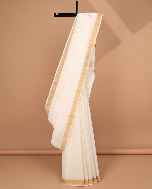 Cream kerala saree, zari border & pallu of zari designs