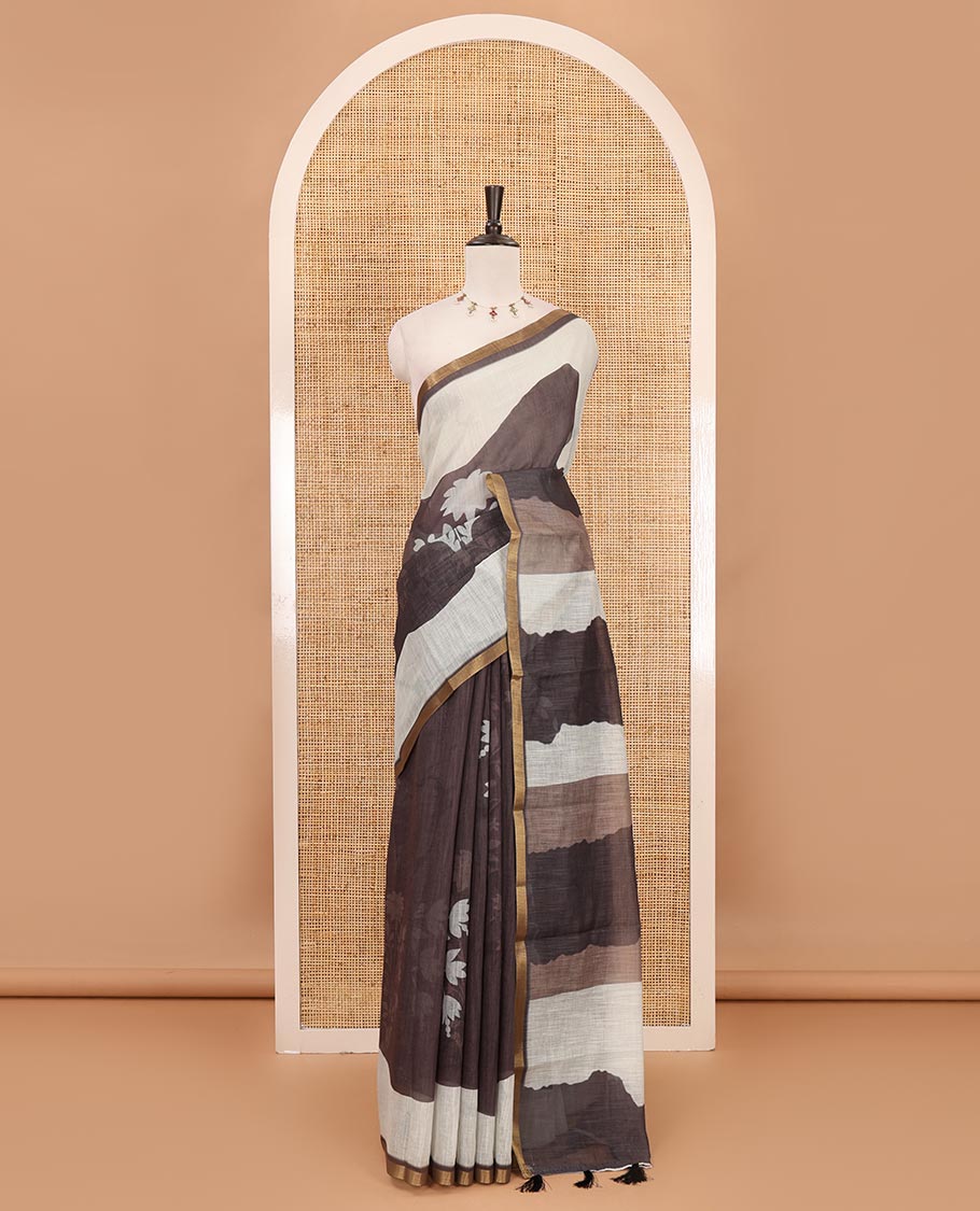 Multi-color abstract-style floral printed linen saree, zari border, printed pallu & unique butta printed blouse