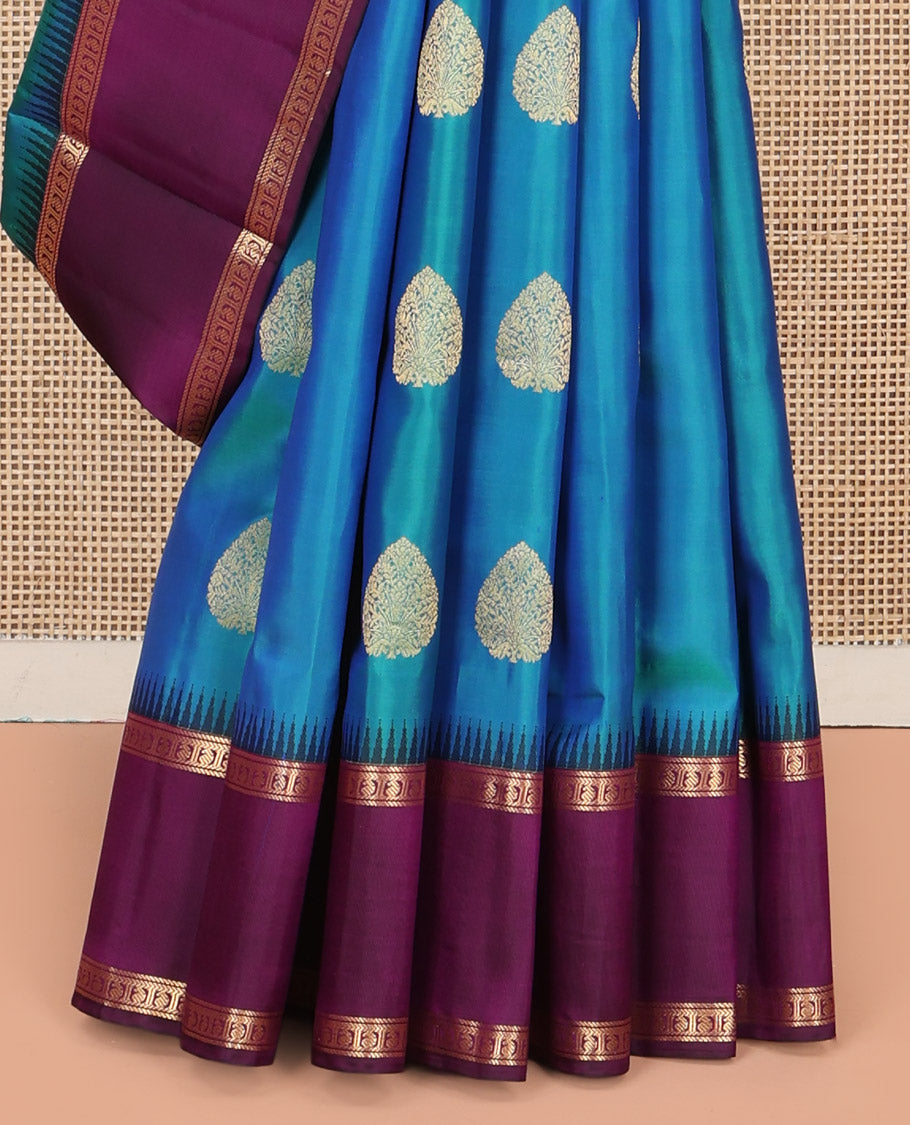 Blue Vasundhara Silk Saree, Delicately Woven with Zari Buttas All Over Its Body, Complemented by a Contrast Rettai Pettu Temple Border of Banaras, and Manga Designs, Grand Jaal Pallu, and Paired with a Contrast Blouse