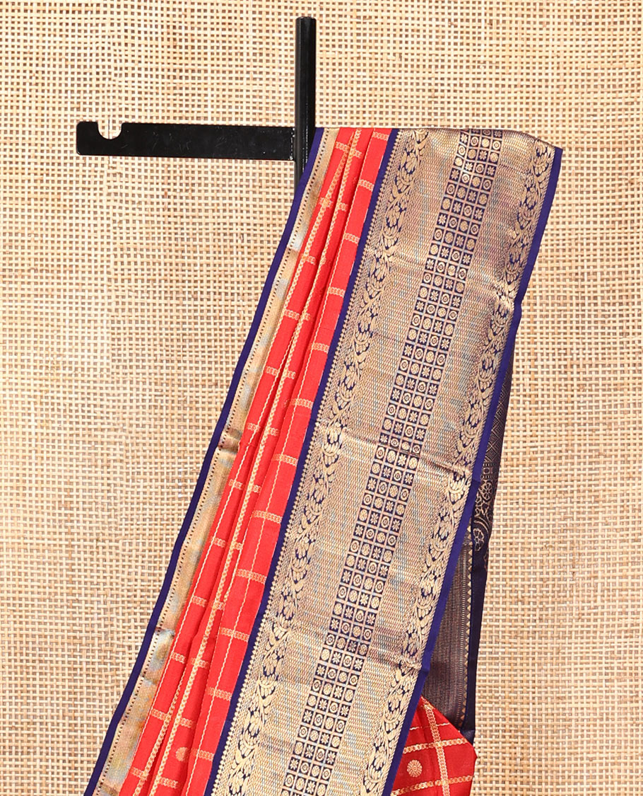 Orange Vasundhara Silk Saree, Enthralled with Zari Butta Enclosed Checks, a Contrast Traditional Zari Border, Grand Jaal Pallu, and a Contrast Blouse
