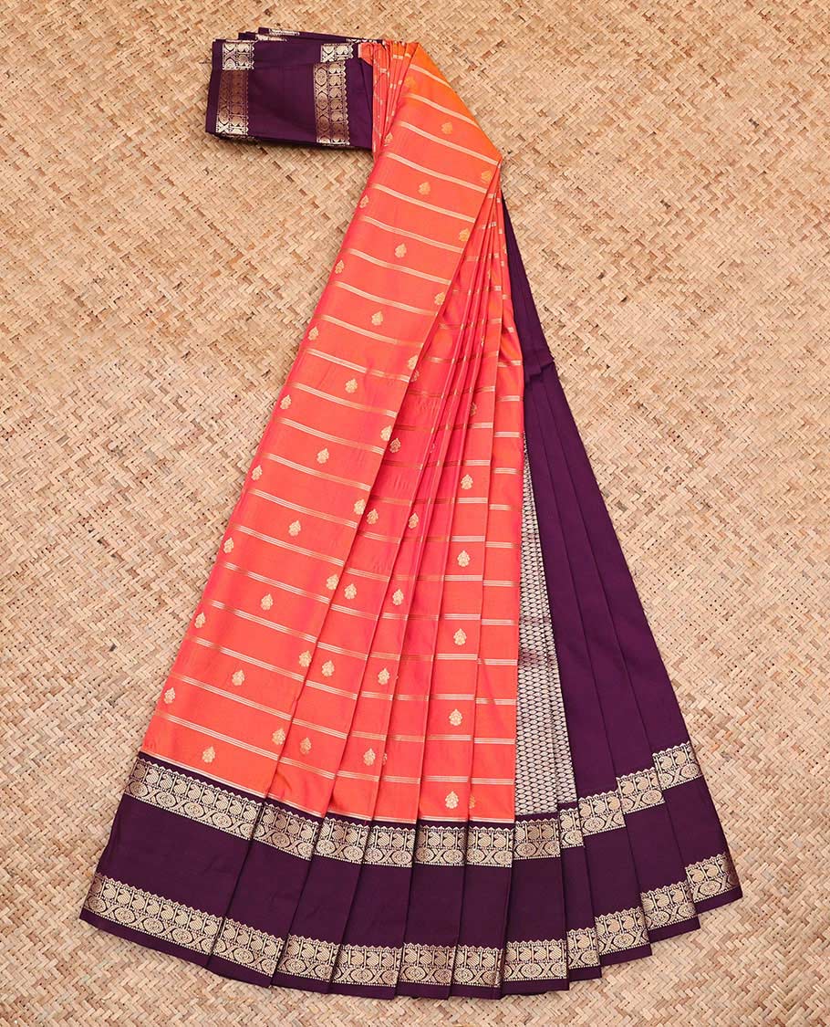 Dark Peach Budget Silk Saree, Gleamed up with Zari Buttas and Zari Stripes All Over Its Body, Complemented by Contrast Rettai Pettu Traditional Zari Designs Woven Border, Grand Jaal Pallu and Paired with a Contrast Blouse