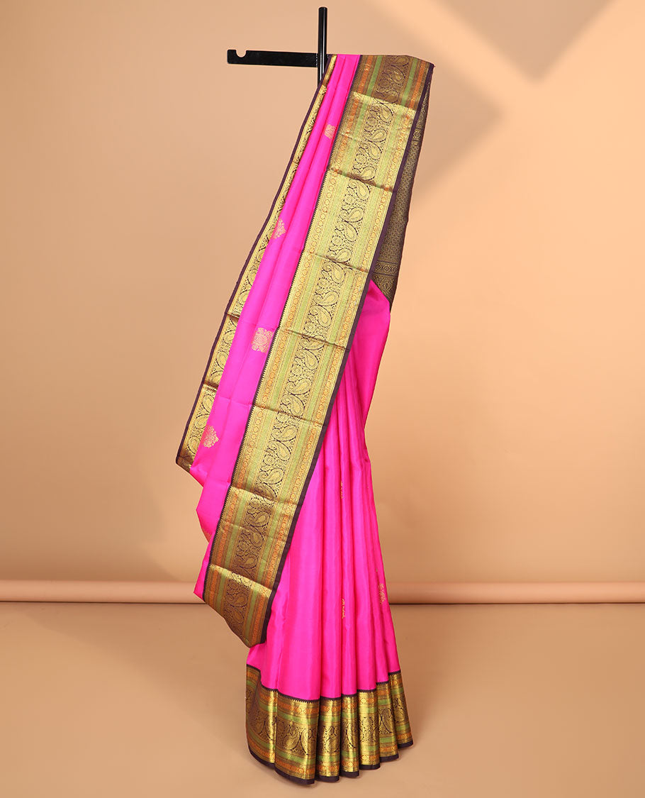 Pink buttas and checked dupion saree, contrast temple border, and pallu of temple designs