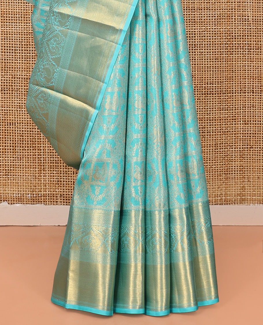 Blue Kanchipuram Tissue Silk Saree, Mesmerized with Jacquard Design, Highlighted by Zari Border of Thilakam, Muthu, Kathir, Mayil Kann, and Mayil, Grand Pallu, and Matching Blouse