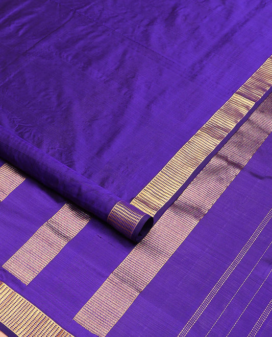 Violet plain nine-yard silk saree, zari Muthu design border, and pallu of zari designs