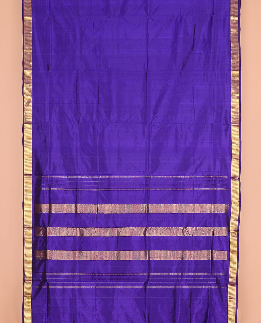 Violet plain nine-yard silk saree, zari Muthu design border, and pallu of zari designs