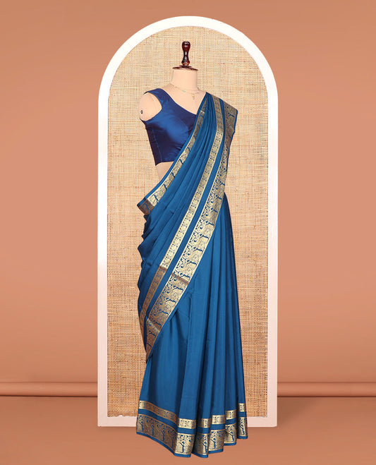 Peacock Blue Plain Mysore Silk Saree, Richly Detailed with Zari Border of Peacock Designs, Sparsely Woven Pallu of Stripes, and Paired with a Matching Blouse