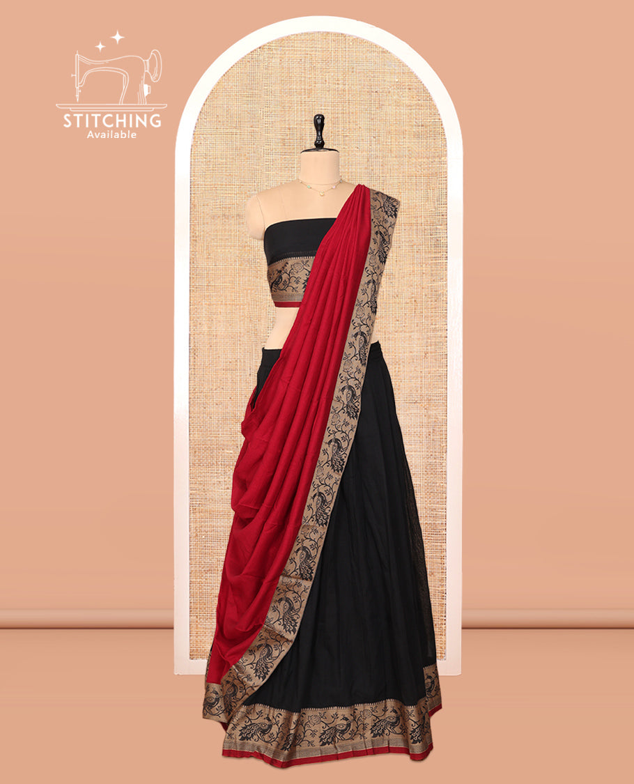 Black Cotton Half-Saree Features Plain Skirt, a Contrast Peacock Border, a Matching Blouse, and a Contrast Peacock Dhavani
