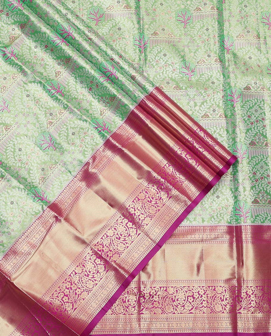 Green Art Silk Material Half Saree Set, Embellished with Jacquard Design Skirt, a Contrast Traditional Zari Design Border, Contrast Zari-Jacquard Blouse, and a Dhavani of Floral Designs